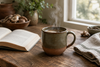 A mug of mushroom coffee steaming on an oak counter
